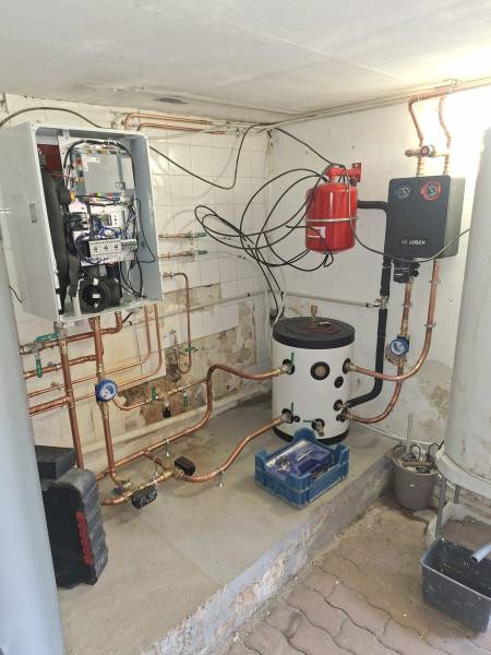 Pose d'une PAC Bosch en remplacement d'une chaudière fioul à Evreux